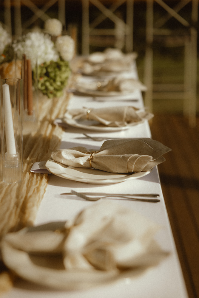 Dinner setting for bridal table on the deck at The Lakehouse Folk