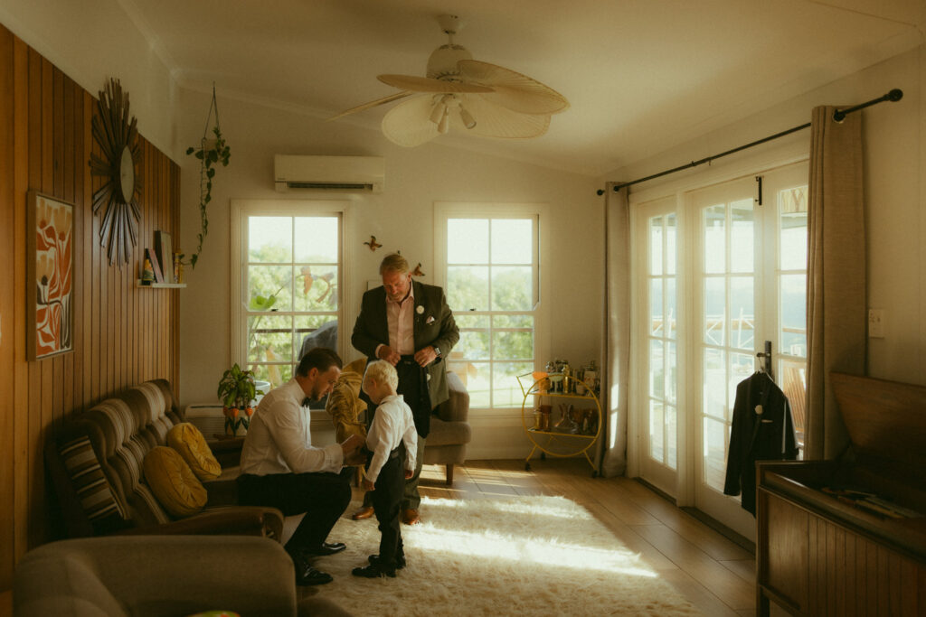 golden light pouring into the groom suite at The Lake House Folk Sunshine Coast